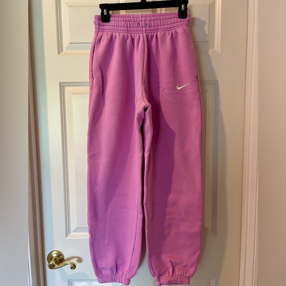 Nike Women’s Pink Fleece Joggers with White Swoosh
